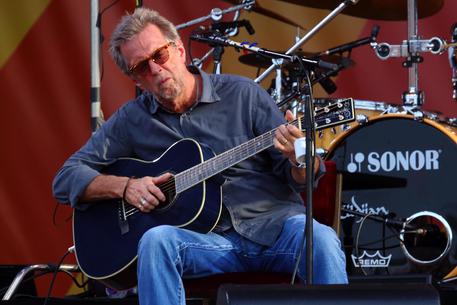 FILE - In this April 27, 2014 file photo, Eric Clapton performs at the 2014 New Orleans Jazz & Heritage Festival at Fair Grounds Race Course  in New Orleans. Clapton's new album, 