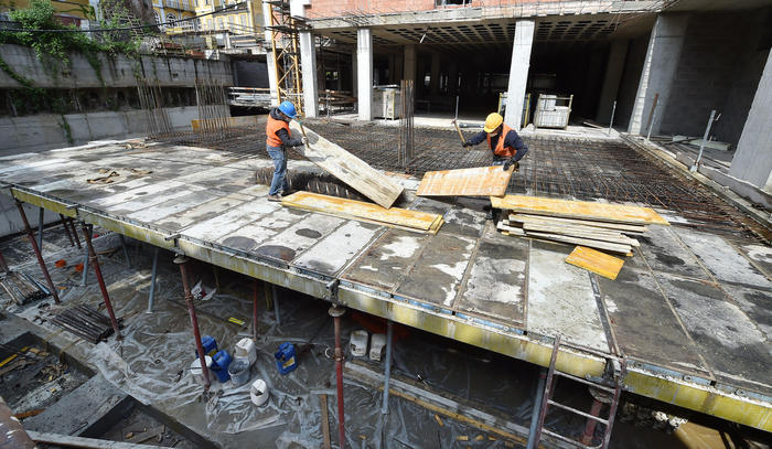 Work resumes on the construction site of the new university building that will be dedicated to Aldo Moro during the Coronavirus emergency, in Turin, Italy, 27 April 2020. From today, all construction companies engaged in public works construction sites considered strategic for the country, related to hydrogeological failure, school construction, public housing and penitentiary, can resume activity. This was said by the Minister of Infrastructure and Transport Paola De Micheli.  ANSA / ALESSANDRO DI MARCO