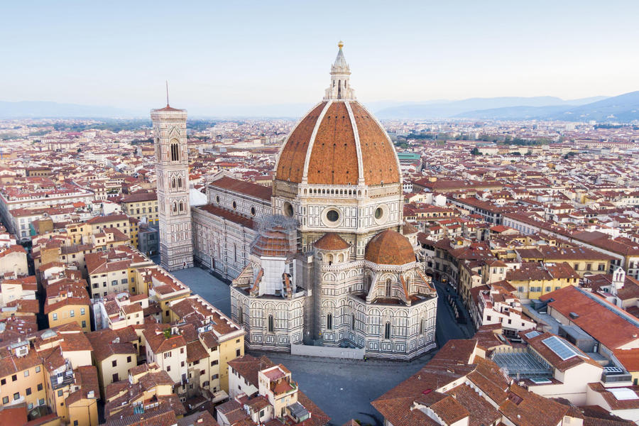 View of the Cathedral of Florence, with Brunelleschi cupola (R) and Giotto's toer (L) on sunrise during lockdown emergency period aimed at stopping the spread of the Covid-19 coronavirus. Although the lockdown and full absence of people, the scenery of the Italian squares and monuments remain fascinating, Florence, Italy, 11 April 2020