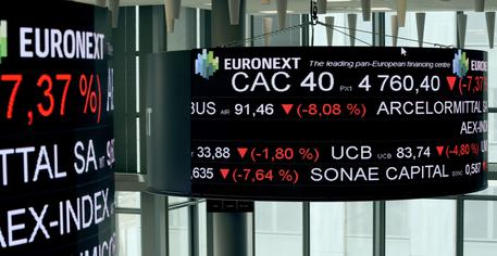 A screen displays the CAC 40 amongst stock tickers displayed at the headquarters of the Pan-European stock exchange Euronext, in La Defense district, near Paris, on March 9, 2020. - The Paris and Frankfurt stock exchanges fell more than 10 percent on March 12 afternoon trading after the European Central Bank unveiled a series of measures to shore up the eurozone economy but did not cut rates. The CAC 40 was down 10.2 percent to 4142.13 around 1340 GMT, while the DAX 30 in Frankfurt had tumbled 10.3 percent to 9,360.58. (Photo by ERIC PIERMONT / AFP)