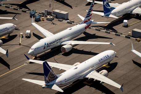 epa08175497 (FILE) - An aerial view of Boeing 737 Max 8 aircraft owned by American Airlines and United Airlines parked at Boeing Field in Seattle, Washington, USA, 21 July 2019 (reissued 29 January 2020). Boeing on 29 January 2020 published their full year and 4th quarter 2019 results saying they suffered 636 million USD losses, its first full-year loss since 1997. Boeing also said they expect the costs related to the crisis of grounding their new 737 Max passenger planes to continue to climb.  EPA/GARY HE   EDITORIAL USE ONLY *** Local Caption *** 55353867