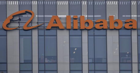 epa08558077 Alibaba logo is seen on their headquarters building in Shanghai, China, 21 July 2020. The Chinese technology and financial-services giant Alibaba's Ant Group, founded by billionaire Jack Ma, is set-up to kick start concurrent IPO's in Hong Kong and Shanghai at the same time bypassing New York.  EPA/ALEX PLAVEVSKI