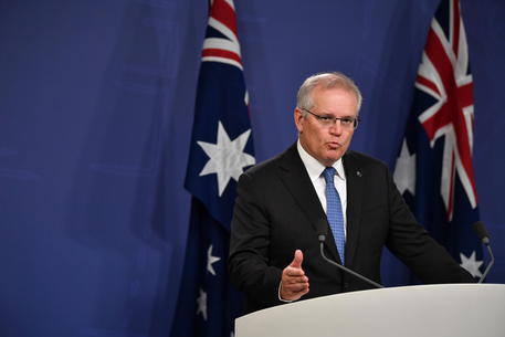 epa09144495 Australian Prime Minister Scott Morrison speaks to the media during a press conference in Sydney, Australia, 19 April 2021. During the press conference, the Australian Prime Minister announced a royal commission into the suicides of veterans and serving Australian Defence Force personnel.  EPA/JOEL CARRETT AUSTRALIA AND NEW ZEALAND OUT