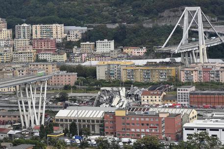 A large section of the Morandi viaduct upon which the A10 motorway runs collapsed in Genoa, Italy, 14 August 2018. ANSA/FLAVIO LO SCALZO