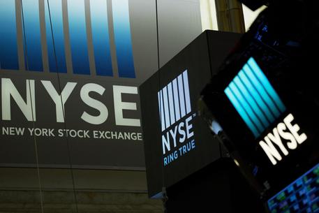 In this Thursday, May 10, 2018, photo, signs for the New York Stock Exchange hang above the trading floor. The NYSE has named its first female leader in the history of the 226-year-old exchange. The parent company of the NYSE, Intercontinental Exchange Inc., told The Wall Street Journal late Monday, May 21, 2018, that Stacey Cunningham will become the 67th president. Shes currently NYSEs chief operating officer. Cunningham will start her new job on Friday, May 25. She succeeds Thomas Farley, who came to the NYSE in November 2013. (ANSA/AP Photo/Mark Lennihan) [CopyrightNotice: Copyright 2018 The Associated Press. All rights reserved.]