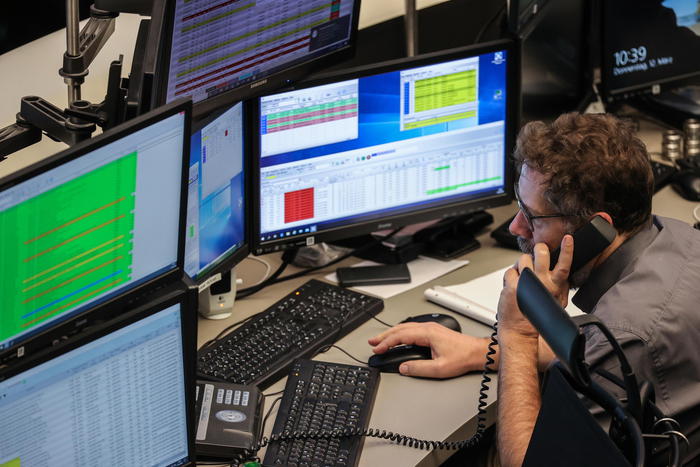 epa08288578 A trader looks at his information screens while working on the floor of the Deutsche Boerse stock exchange in Frankfurt/Main, Germany, 12 March 2020. Germany's main stock market index DAX index dropped below the 10,000 points mark during the trading day.  EPA/ARMANDO BABANI