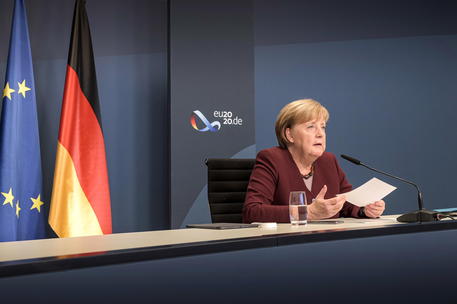 epa08835958 A handout photo made available by the German Federal Government's Press Office shows German Chancellor Angela Merkel as she takes part in day teo of a virtual G20 Summit 2020 via a videoconference at the Chancellery in Berlin, Germany, 22 November 2020. The G20 summit 2020 is held on in a virtual format due to Covid-19 pandemic caused by SARS-CoV-2 coronavirus.  EPA/GUIDO BERGMANN / GERMAN FEDERAL GOVERNMENT HANDOUT  HANDOUT EDITORIAL USE ONLY/NO SALES