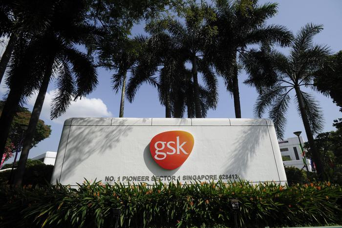 epa04407029 (FILE) A file photo dated 25 July 2014 showing the logo of GlaxoSmithKline at the front of their manufacturing plant in Singapore. A Chinese court on 19 September 2014 fined London-based GlaxoSmithKline 3 billion yuan (490 million dollars) and sentenced the former head of GSK China to three years in prison for bribery, state media said. The court in the central province of Hunan sentenced Mark Reilly, the former head of GSK China, to three years in prison and several other former GSK China executives to between two and three years in prison, the official Xinhua news agency said. A 10-month investigation found that Reilly had 'ordered his subordinates to offer bribes,' police said earlier. The police investigation concluded that the company had forced sales teams to bribe medical staff to meet rising sales targets.  EPA/WALLACE WOON