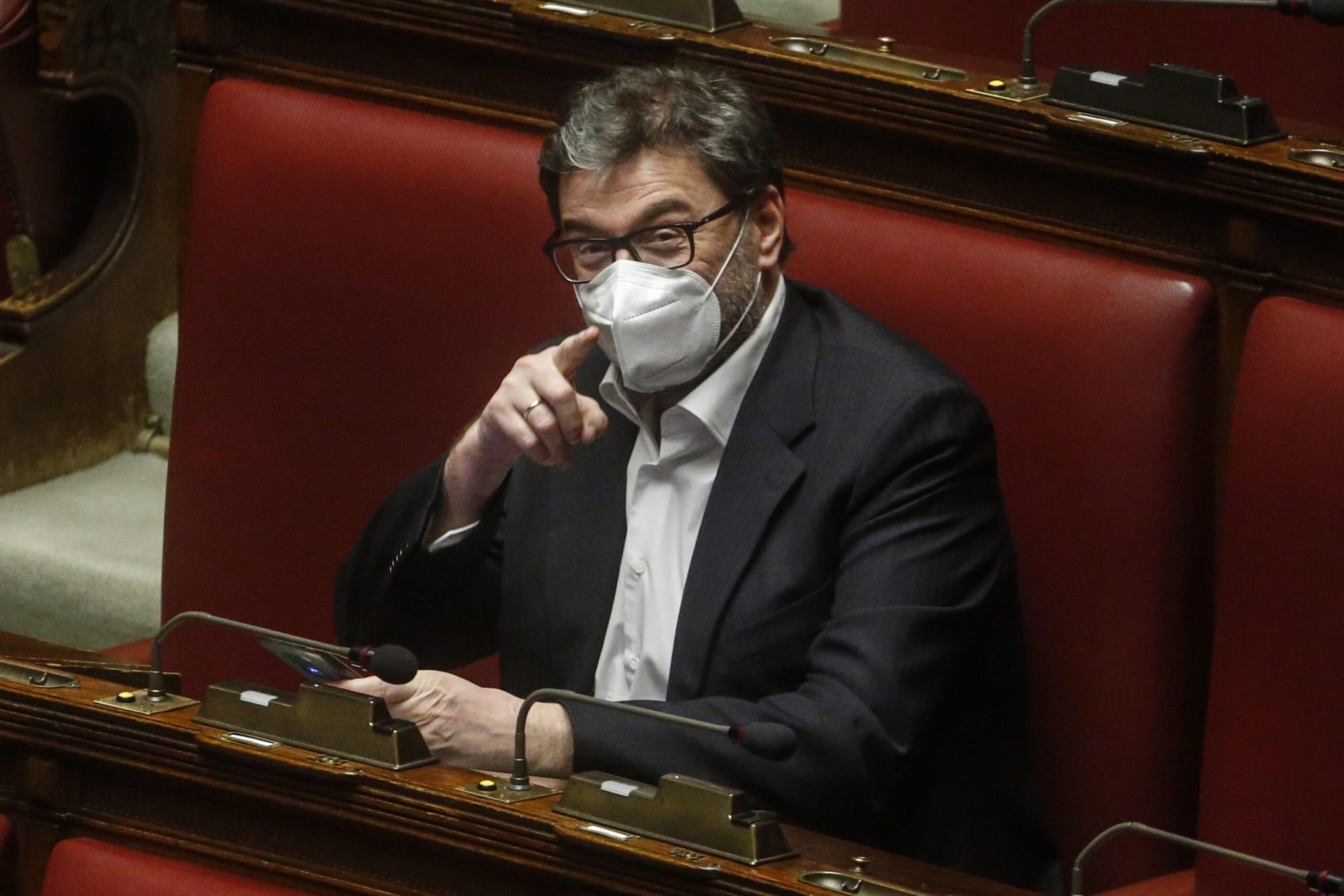 epa09716850 Giancarlo Giorgetti, at the Lower House (Chamber of Deputies) in Rome, Italy, 29 January 2022. Leaders of the ruling parties have asked current Italian President Sergio Mattarella to stay on as head of state after failing to choose a candidate who could be supported by the 1,009 parliamentarians and regional representatives electing the president. Mattarella secured 387 votes in the seventh round of voting early on 29 January and is expected to secure the 505 votes required to win in eighth round of voting which is expected to take place later on 29 January.  EPA/Fabio Frustaci / POOL