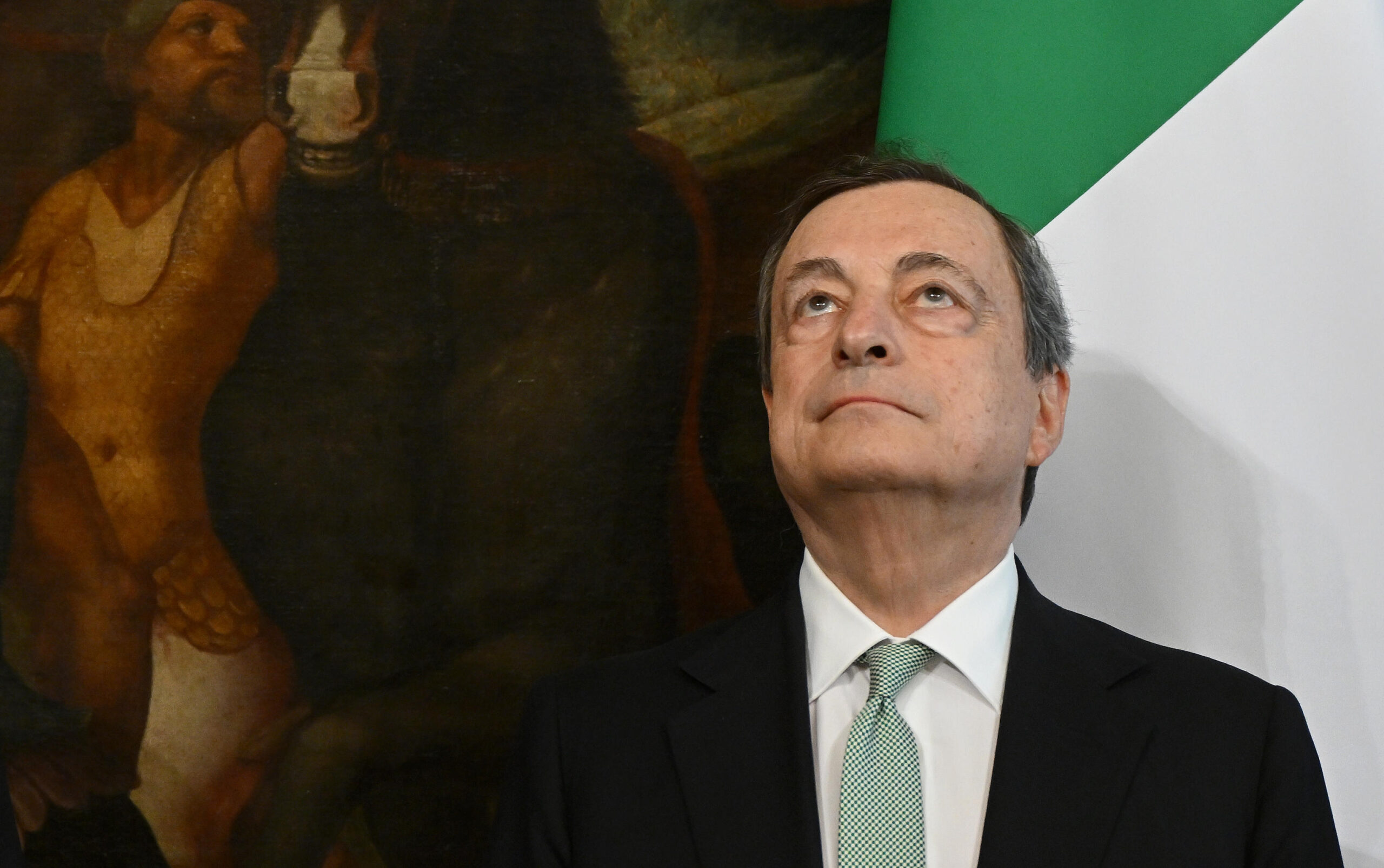 Italian Prime Minister Mario Draghi looks on during signing of a memorandum of understanding after a meeting with Algerian President at Chigi Palace in Rome, Italy, 26 May 2022.  ANSA/ETTORE FERRARI