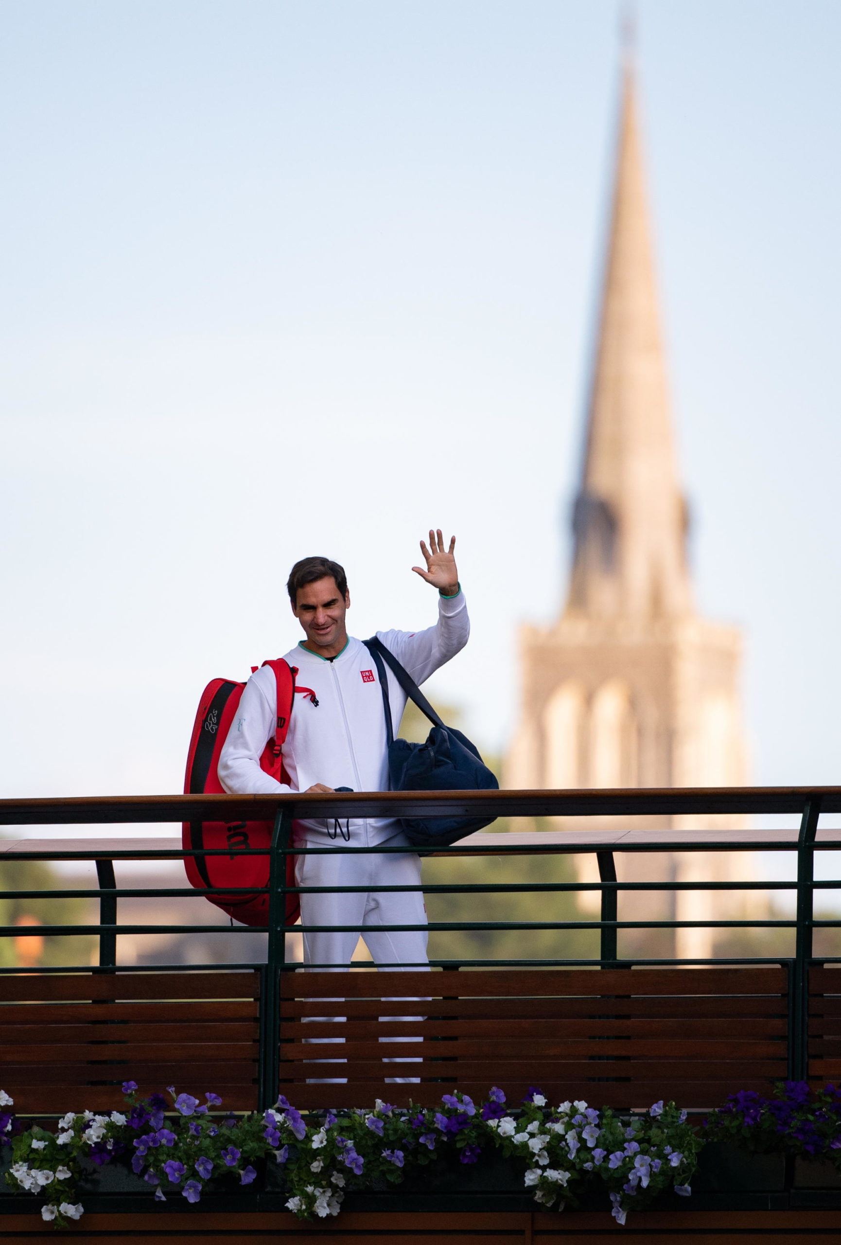 epa09330022 Roger Federer of Switzerland walks across the players bridge at The All England Lawn Tennis Club, Wimbledon, Britain, 07 July 2021.  EPA/AELTC / Ben Solomon / POOL   EDITORIAL USE ONLY  EDITORIAL USE ONLY