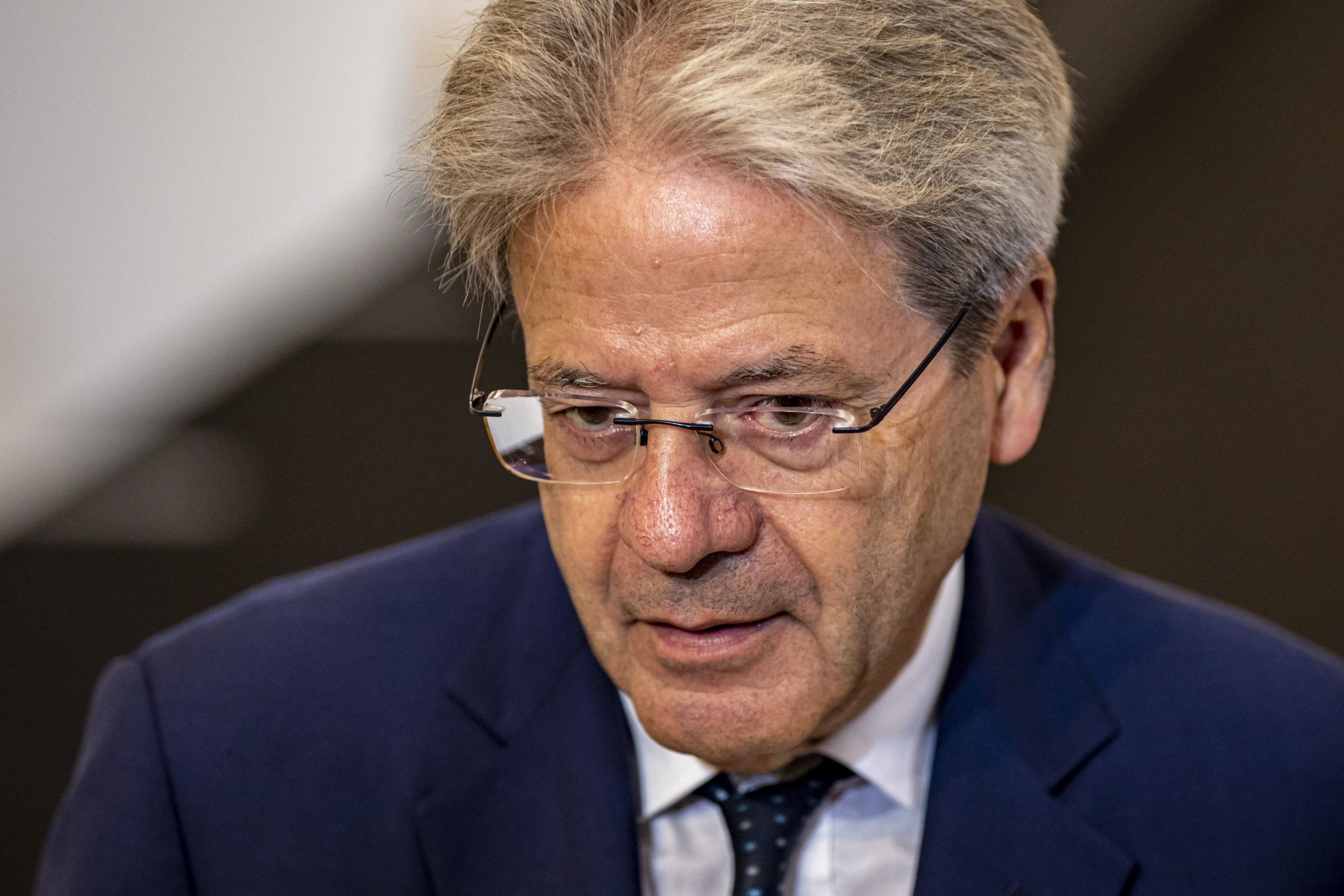 epa10172474 European Commissioner for Economy Paolo Gentiloni talks to media as he arrives for the European Economic and Financial Affairs Ministerial Meeting in Prague, Czech Republic, 09 September 2022.  EPA/MARTIN DIVISEK