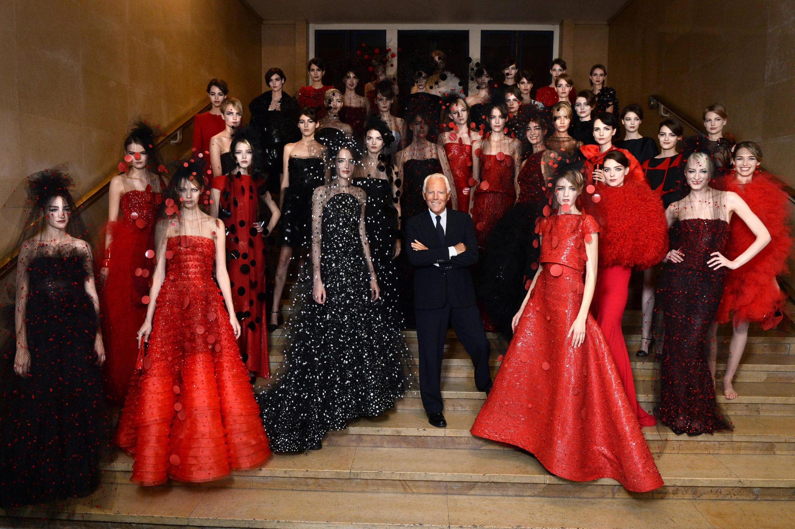 Giorgio Armani and models pose for a picture during the Giorgio Armani Privé Show as part of Paris Fashion Week Haute Couture Fall-Winter 2014-2015 in Paris, France, 08 July 2014. ANSA/ GIORGIO ARMANI PRESS OFFICE  ++ HO - NO SALES, EDITORIAL USE ONLY ++