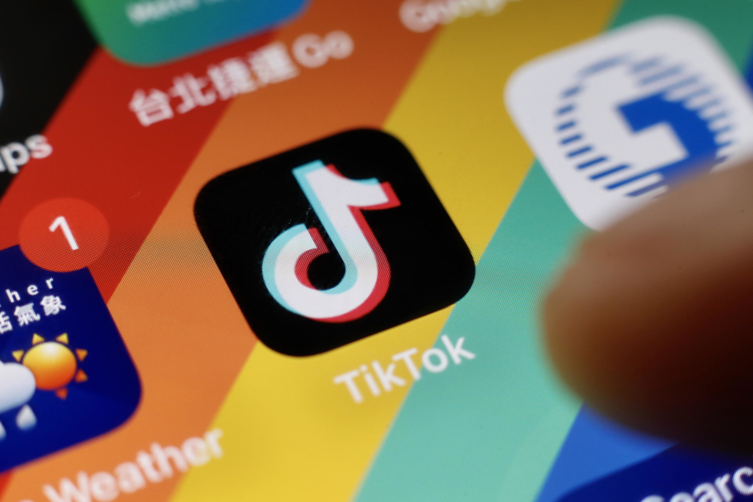 epa10351130 The Tiktok application logo is pictured on a smartphone in Taipei, Taiwan, 06 December 2022. On 02 December, the The US Federal Bureau of Investigation (FBI) warned about Tiktok, that it presents national security concerns in regards to the integrity of the application's algorithm. On 05 December, a Ministry of Digital Affairs (MODA) official announced that the application have been deemed to be 'harmful product against national information security.'  EPA/RITCHIE B. TONGO