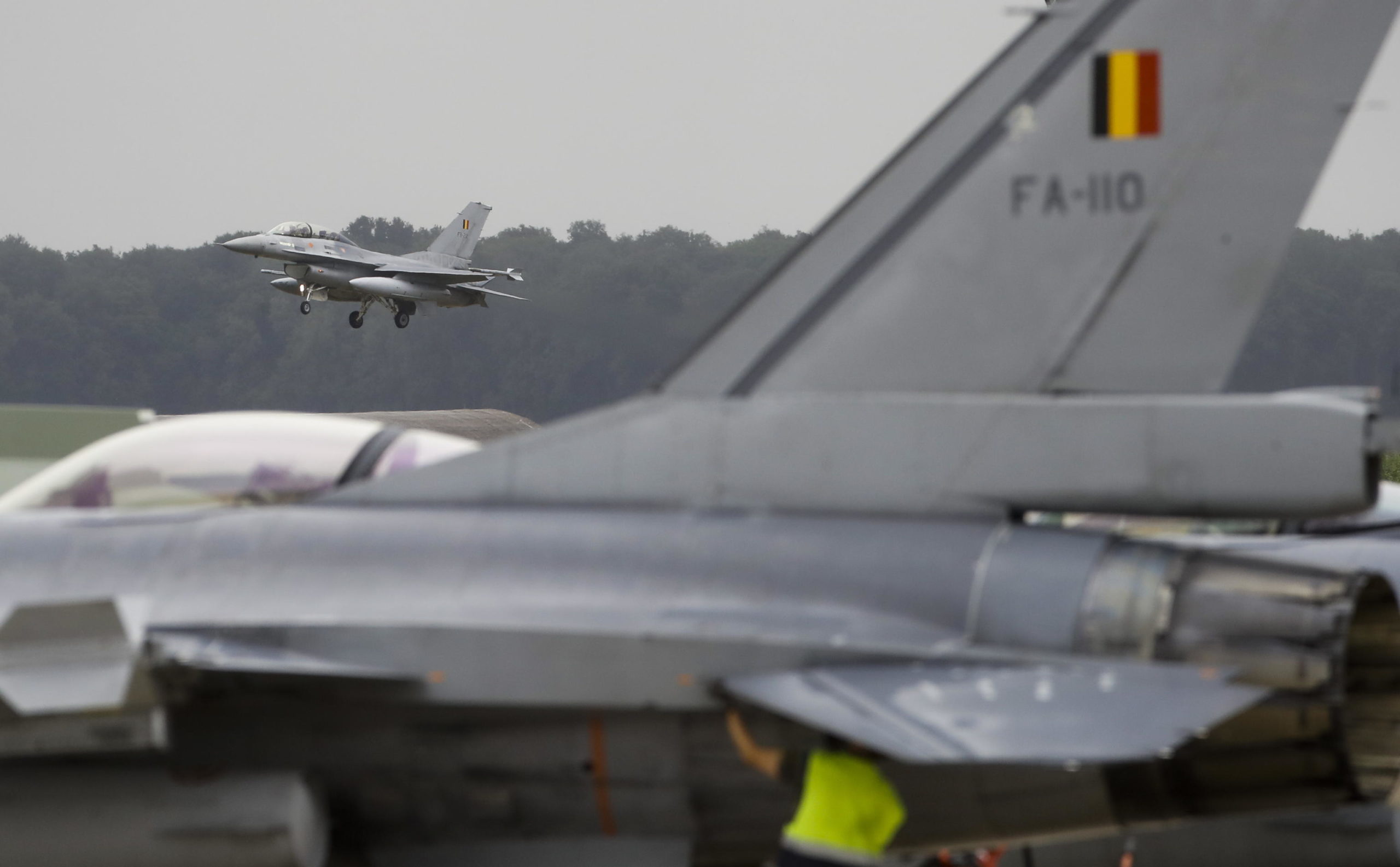 epa10101351 One of the Four F16 aircrafts of Belgium Defense landing in Florenne, Belgium, 01 August 2022. Belgian F-16s finish an eight-month deployment in support of NATO Air Policing and, subsequently, NATO enhanced Vigilance Activities in Estonia. The Belgian eVA detachment consists of 72 people. In order to operate four F-16s, the expertise of 45 technicians is needed on site. Since the beginning of the eVA mission, Belgian F-16s have flown more than 1,000 flying hours in less than four months. EPA/OLIVIER HOSLET