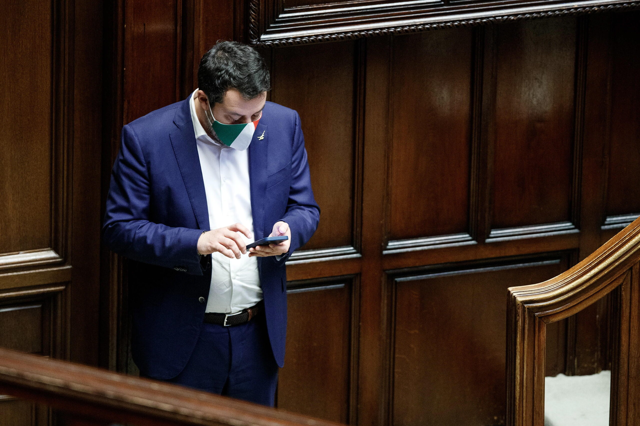 epa09714119 Italy's League party leader Matteo Salvini checks his mobile phone during the fifth ballot of the presidential election at the Lower House (Chamber of Deputies), in Rome, Italy, 28 January 2022. Italian lawmakers from both houses of Parliament and regional representatives on 28 January are taking part in the fifth ballot of the presidential election, after the first four rounds of voting proved inconclusive.  EPA/ROBERTO MONALDO / POOL