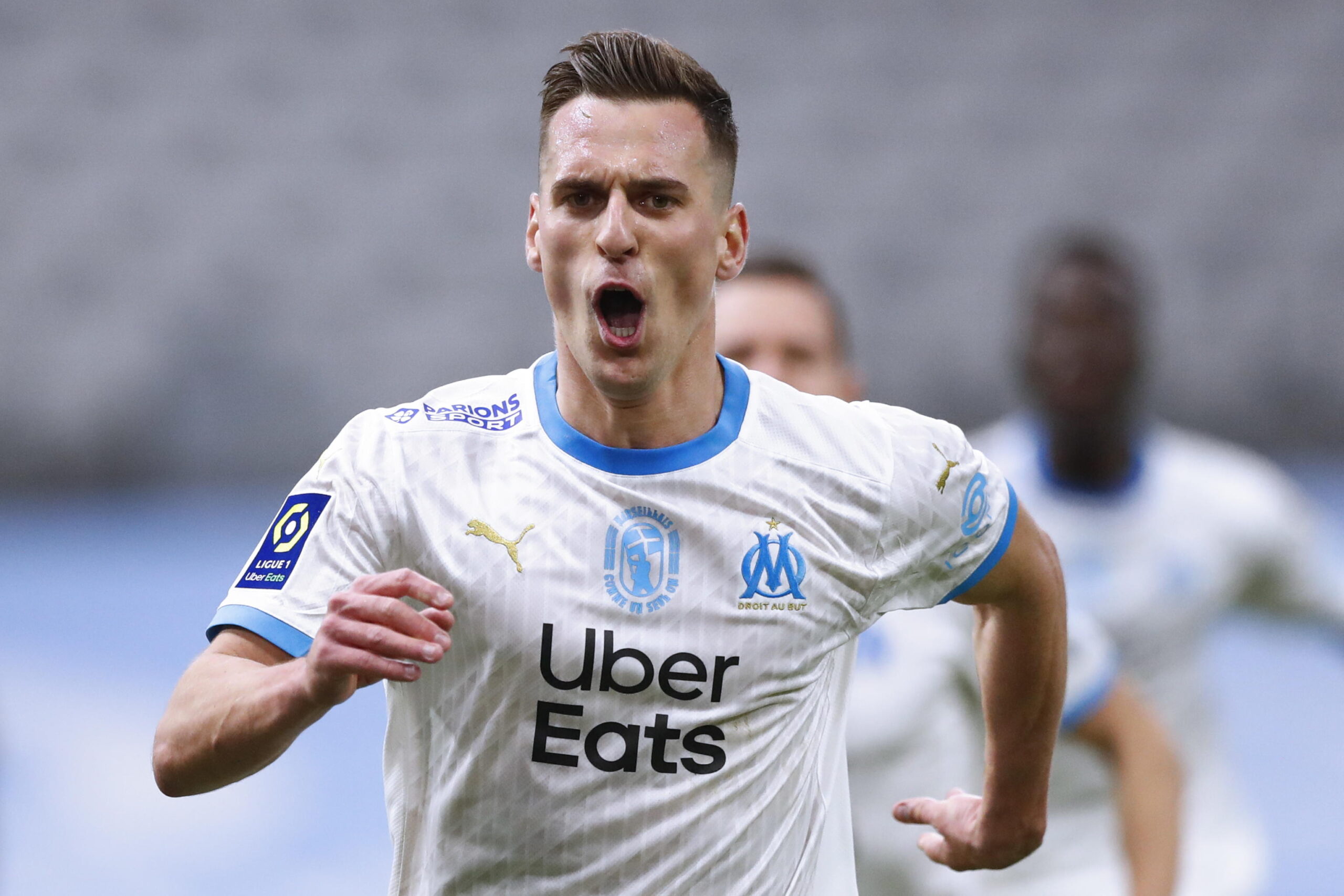 epa09043561 Marseille's Krystian Arkadiusz Milik celebrates scoring on penalty during the ligue 1 soccer match between Olympique Marseille and Olympique Lyon, in Marseille, France, 28 February 2021.  EPA/Guillaume Horcajuelo