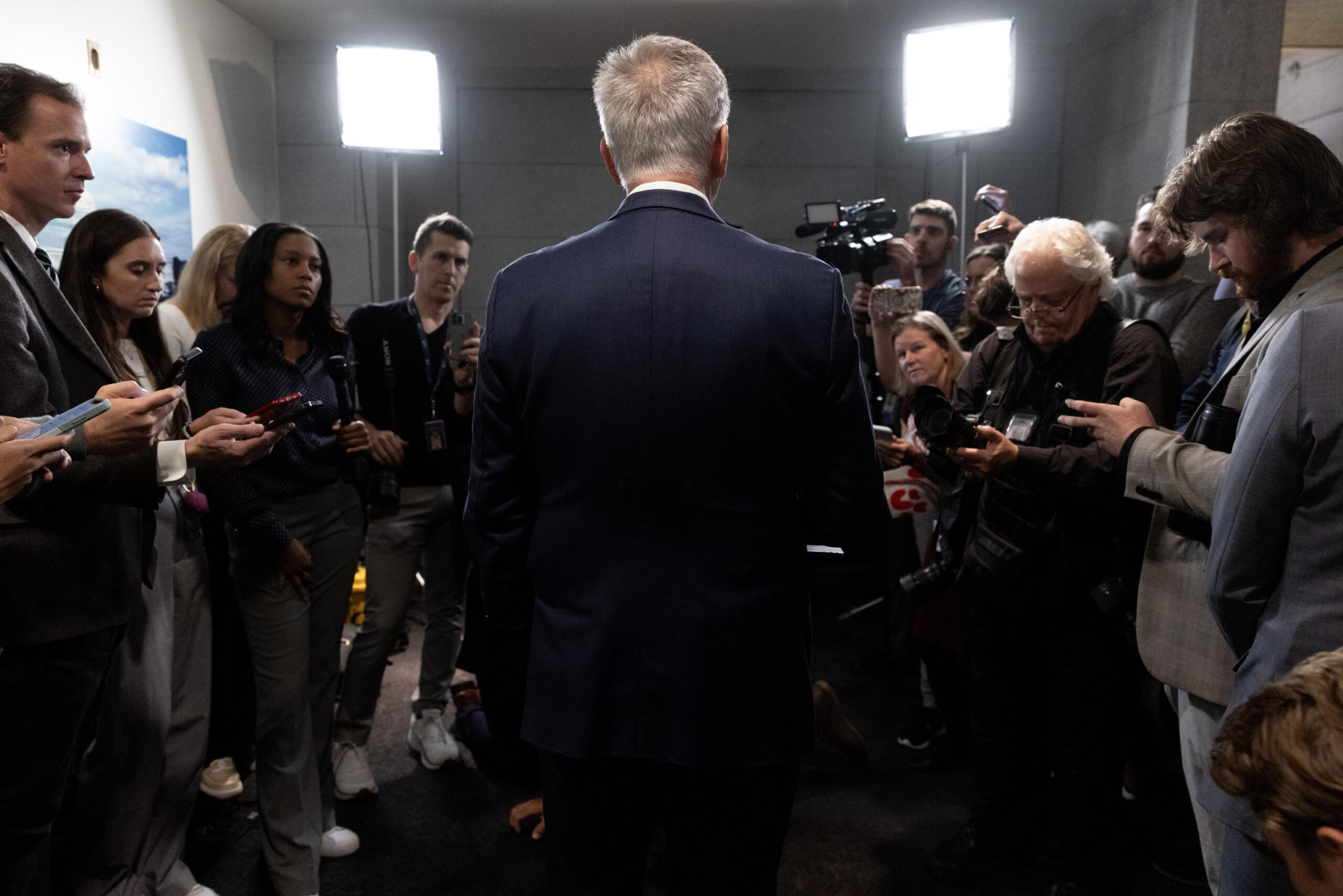 epa10892227 US Speaker of the House Kevin McCarthy speaks to members of the news media following a meeting of the House Republican Conference on Capitol Hill in Washington, DC, USA, 30 September 2023. Speaker McCarthy announced the House will vote on a stop-gap government funding measure. The Senate and House of Representatives are working on measures to avert a government shutdown before a 01 October deadline.  EPA/MICHAEL REYNOLDS