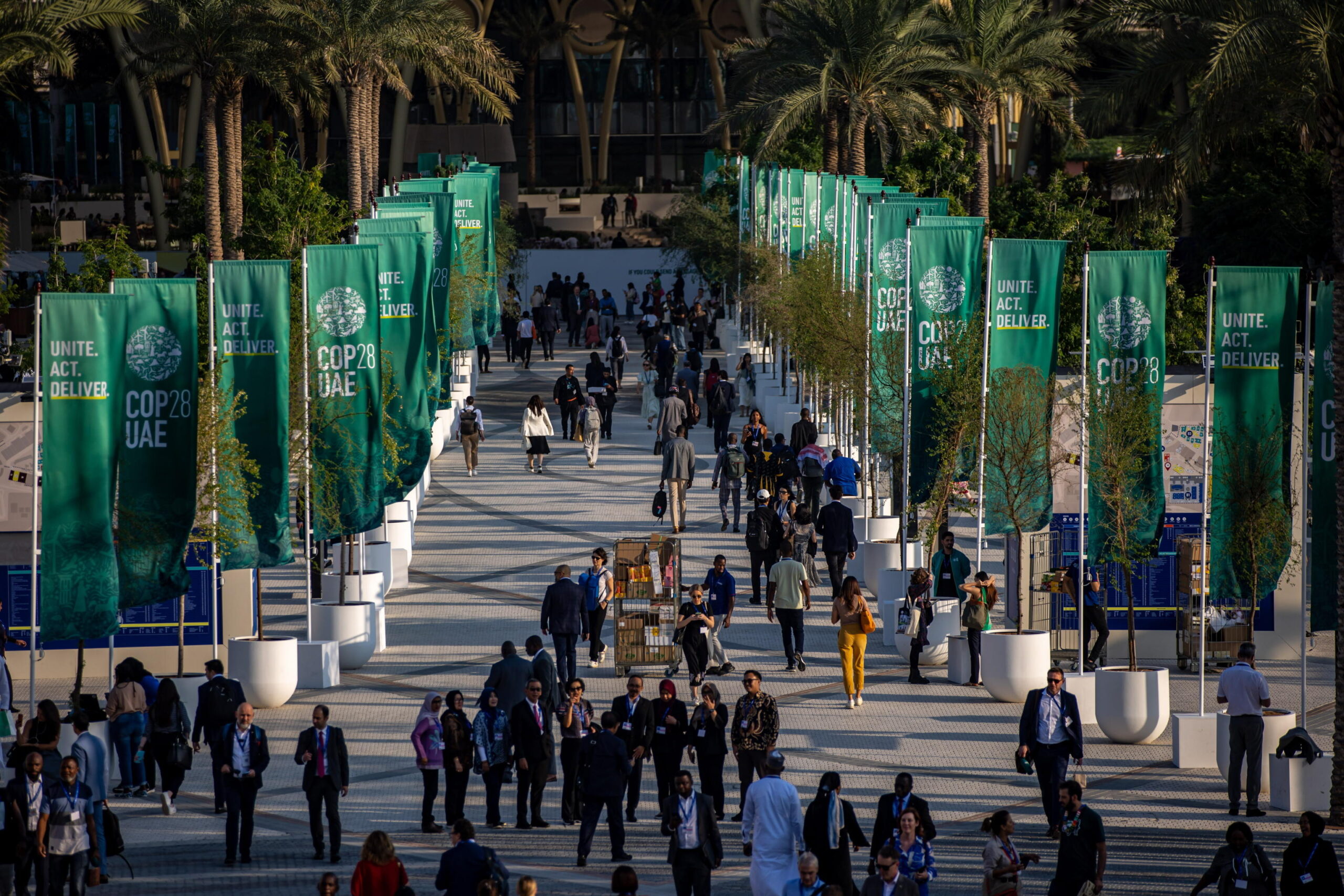 epa11013697 Participants walk at Expo City Dubai, the venue of the 2023 United Nations Climate Change Conference (COP28), in Dubai, United Arab Emirates, 06 December 2023. The 2023 United Nations Climate Change Conference (COP28), runs from 30 November to 12 December, and is expected to host one of the largest number of participants in the annual global climate conference as over 70,000 estimated attendees, including the member states of the UN Framework Convention on Climate Change (UNFCCC), business leaders, young people, climate scientists, Indigenous Peoples and other relevant stakeholders will attend. EPA/MARTIN DIVISEK