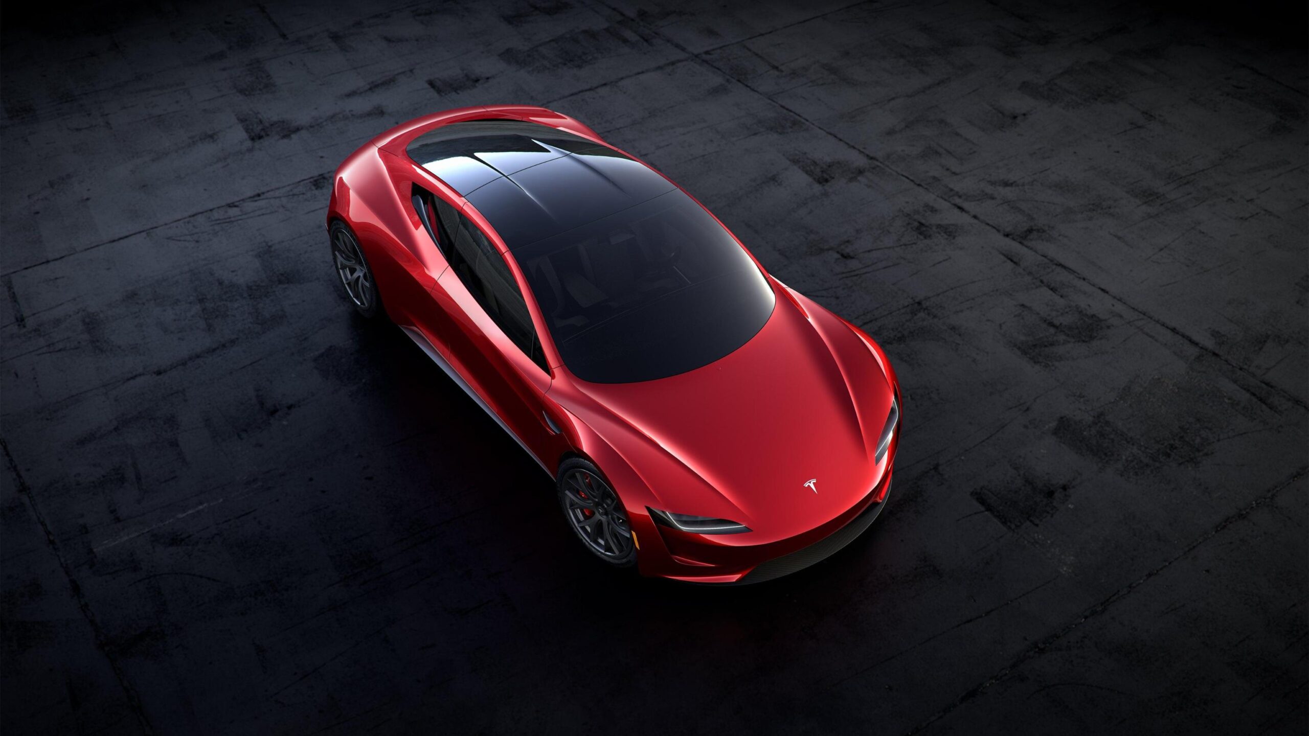epa06335612 A handout photo made available by Tesla 16 November 2017, showing an artists' view of the new Tesla Roadster electric sports vehicle. The car was presented to media 16 November 2017 at Tesla's Los Angeles design centre, Los Angeles, USA. Tesla says the Roadster will accelerate from 0-60 mph (or 0-96 km/h) in less than two seconds. Tesla says the new Roadster will cost 200,000 USD and will be released in some three years time. Tesla has began to take in orders for the new Roadster, and says new buyers will have to pay a 45,000 USD deposit. However, clients interested in buying one of the first 1,000 vehicles of the limited edition 'Founders Series' will have to pay 250,000 USD for the car.  EPA/TESLA HANDOUT  HANDOUT EDITORIAL USE ONLY/NO SALES