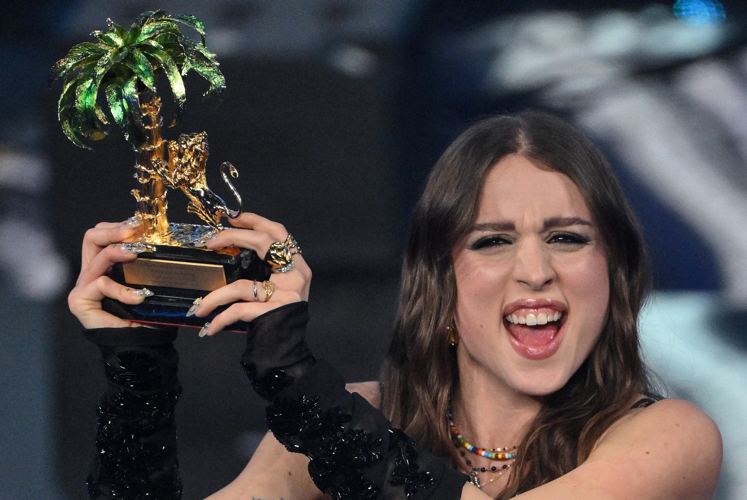 Italian singer Angelina Mango celebrates with the trophy after winning the Sanremo Italian Song Festival at the Ariston theatre during the 74th Sanremo Italian Song Festival, Sanremo, Italy, 10 February 2024. The music festival will run from 06 to 10 February 2024. ANSA/ETTORE FERRARI